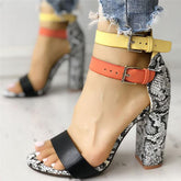 Sandalias peep toe con estampado de serpiente y hebillas bicolor
